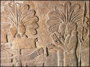 Relieve Asirio con detalle de elementos vegetales de la region.